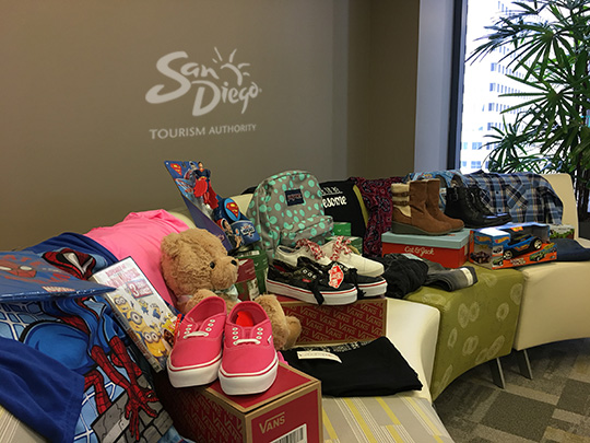 SDTA team donated gifts to four families, as part of the Alpha Project.