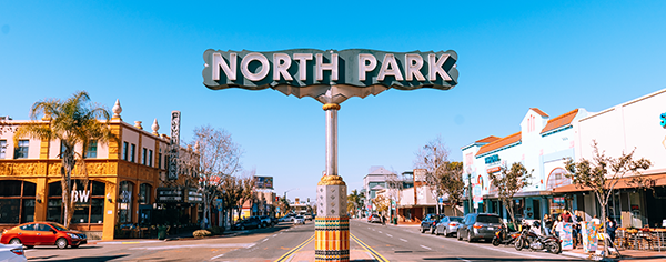 North Park's main street sign in the middle of the road.